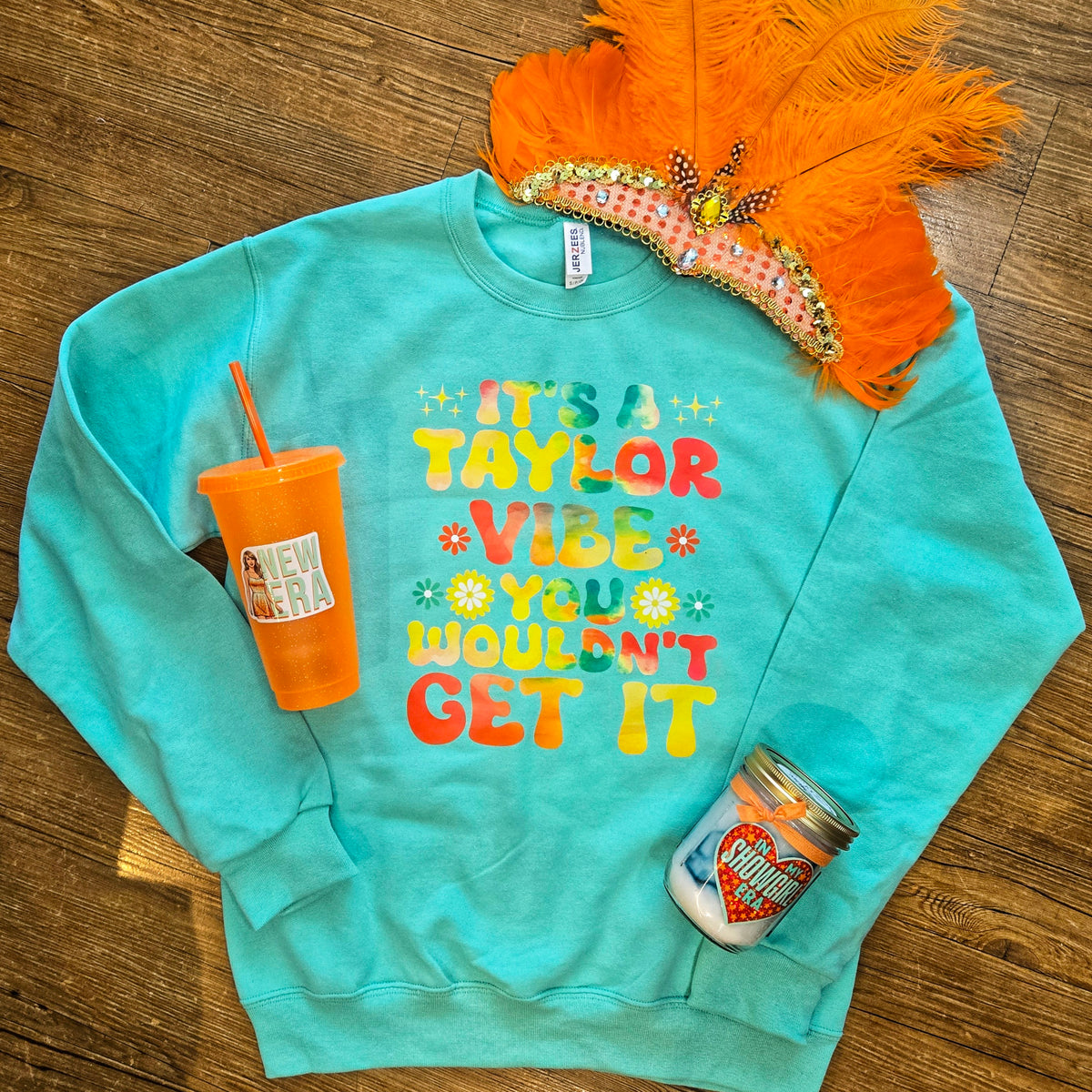 It's a Taylor Vibe crewneck sweatshirt