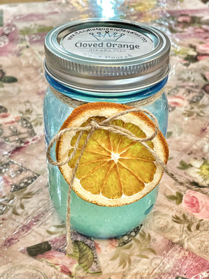 Oranged Clove candle in turquoise jar